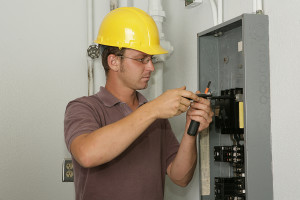 bigstockphoto_Electrician_Industrial_Panel_2009627