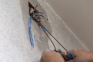 electrician rewiring a house in burbank