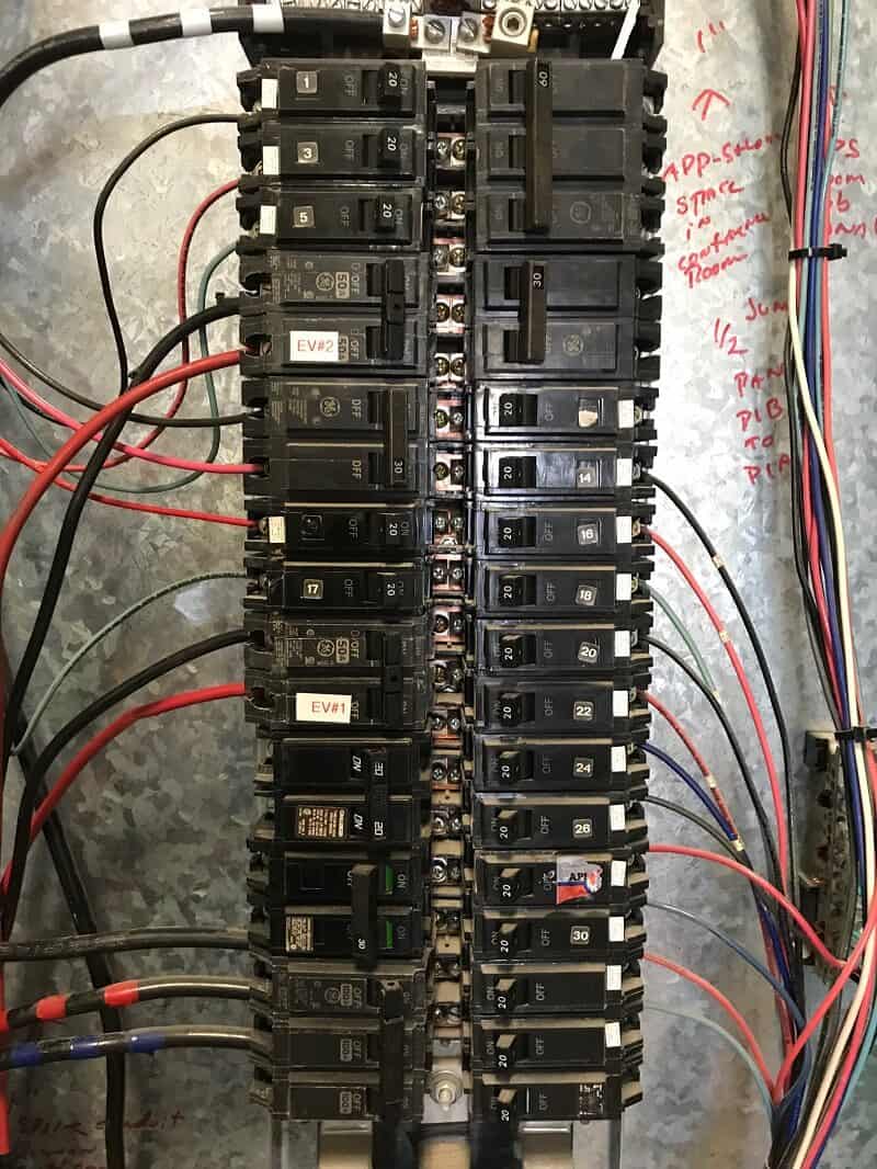 open electrical panel with wires running to it