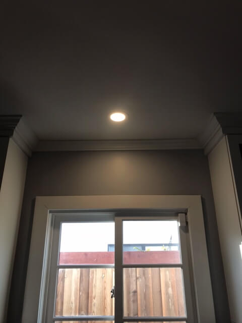 recessed lighting above window